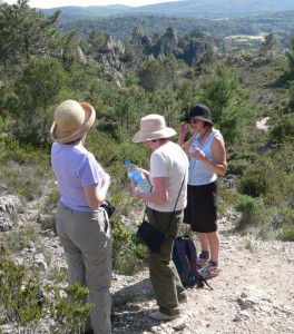 Three women on a walk admire beautiful views in France, by Sabrina